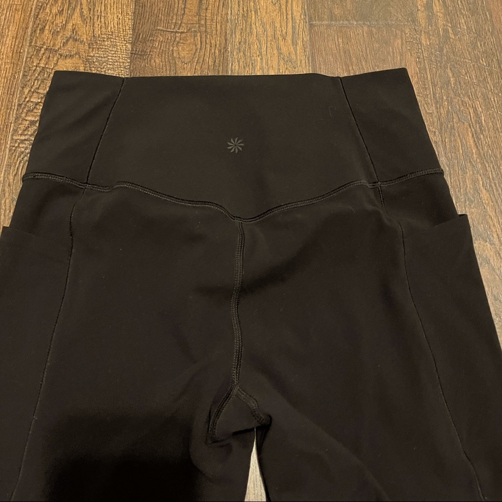 Athleta Salvation stash pocket leggings medium 7/8